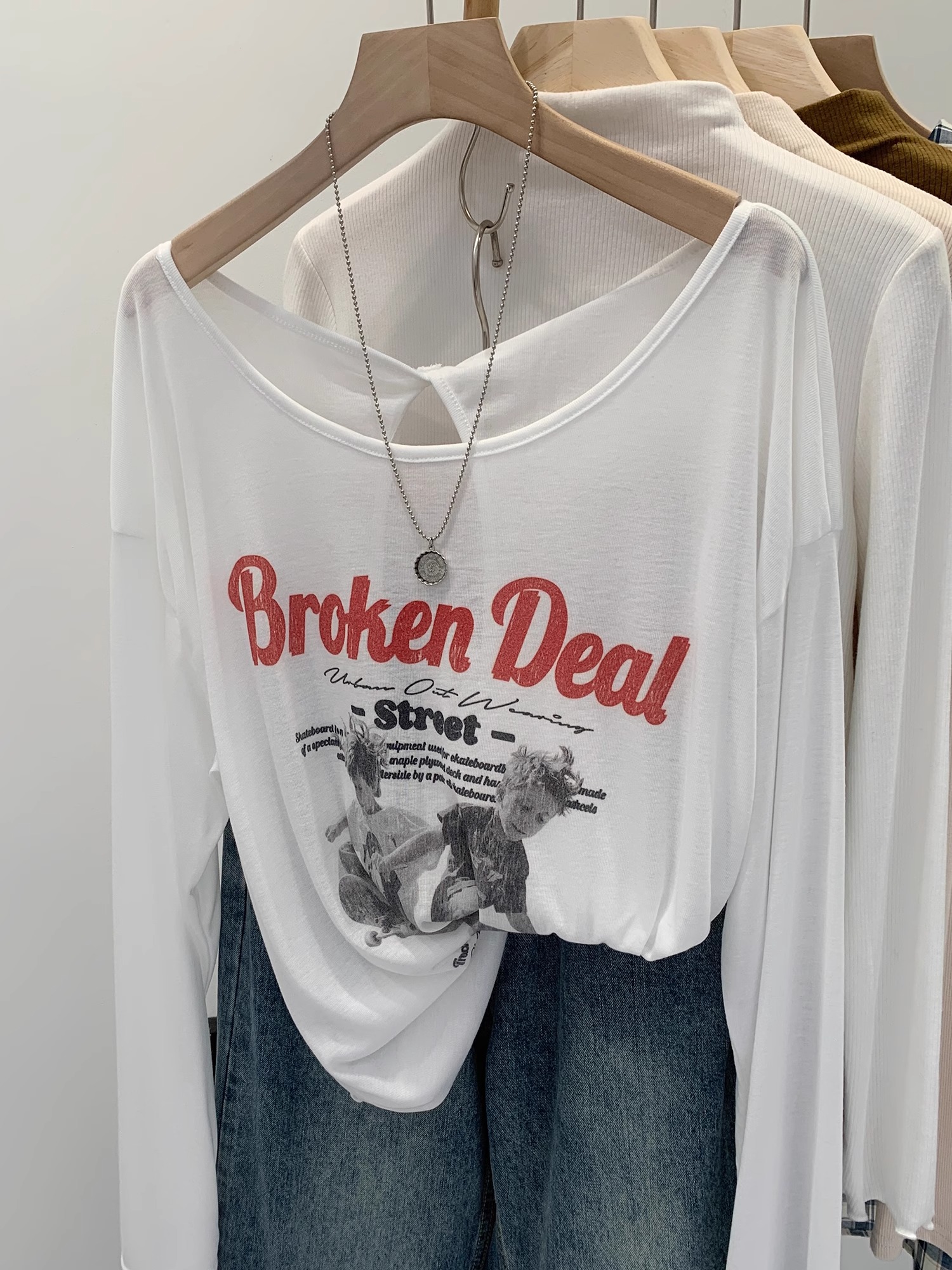 美式超好看复古印花宽松长袖T恤女时尚新款后背镂空防晒罩衫上衣