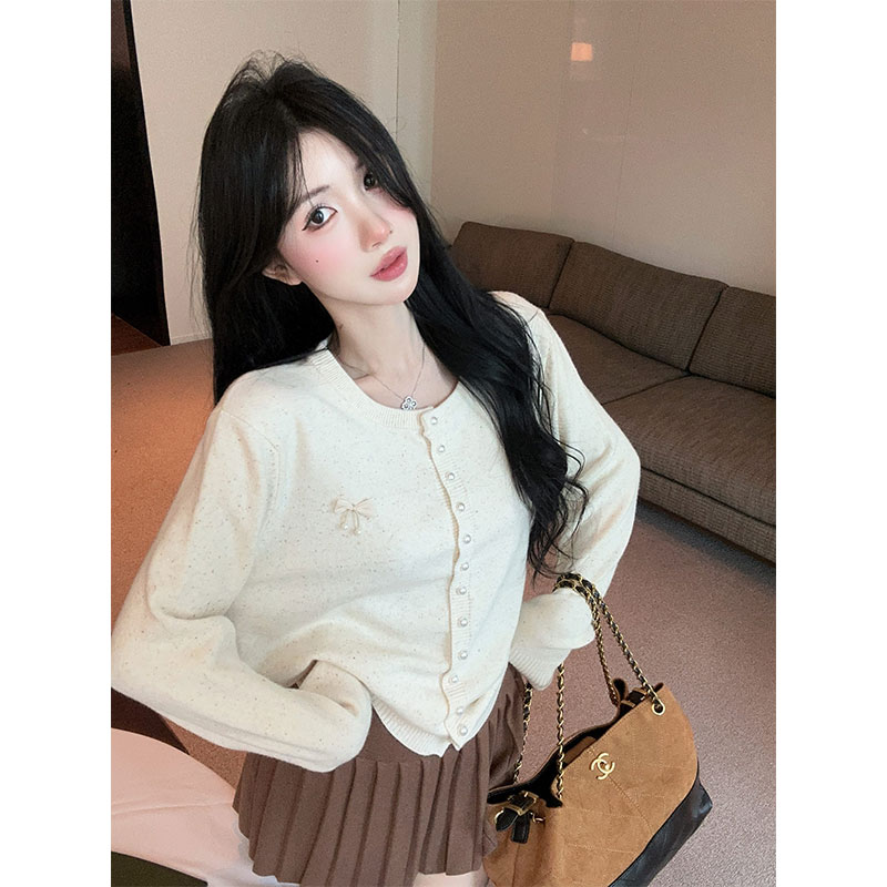 2025秋季新款辣妹圆领单排扣针织开衫蝴蝶结毛衣配修身百褶裙套装