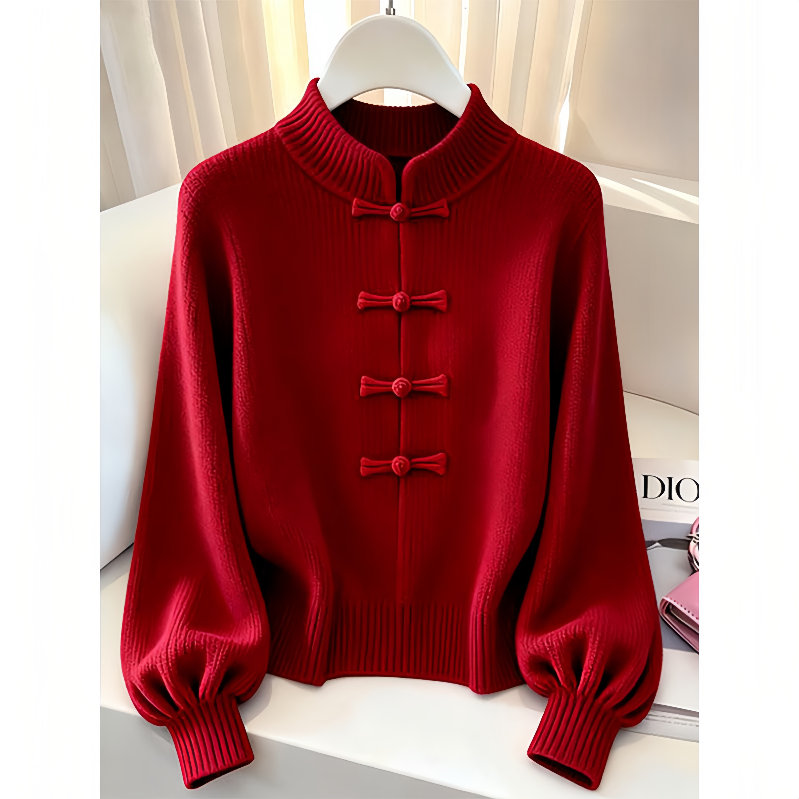 新中式立领盘扣粗线上衣2026秋季独特超好看短款灯笼袖针织衫