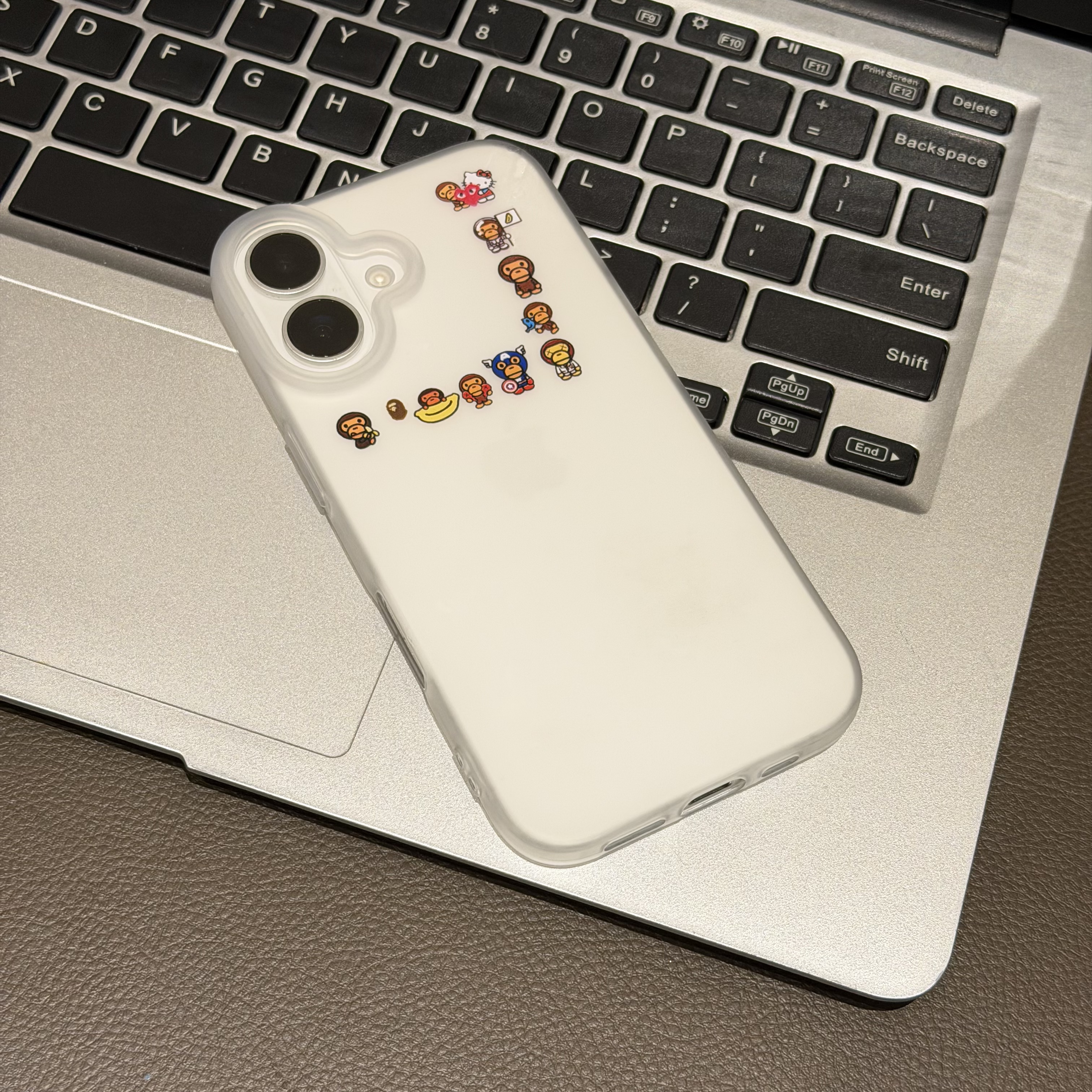 卡通围圈猿人猴适用苹果17PROMAX手机壳iPhone15大孔磨砂16简约