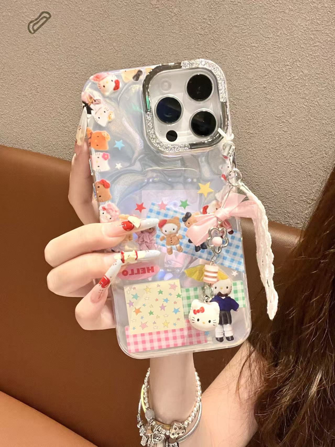 卡通可爱KT绸缎纹壳适用苹果16/15/14/13防摔手机壳