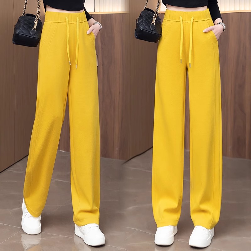 今年流行的黄色阔腿香蕉裤女2025春秋新款松紧高腰垂感休闲弯刀裤