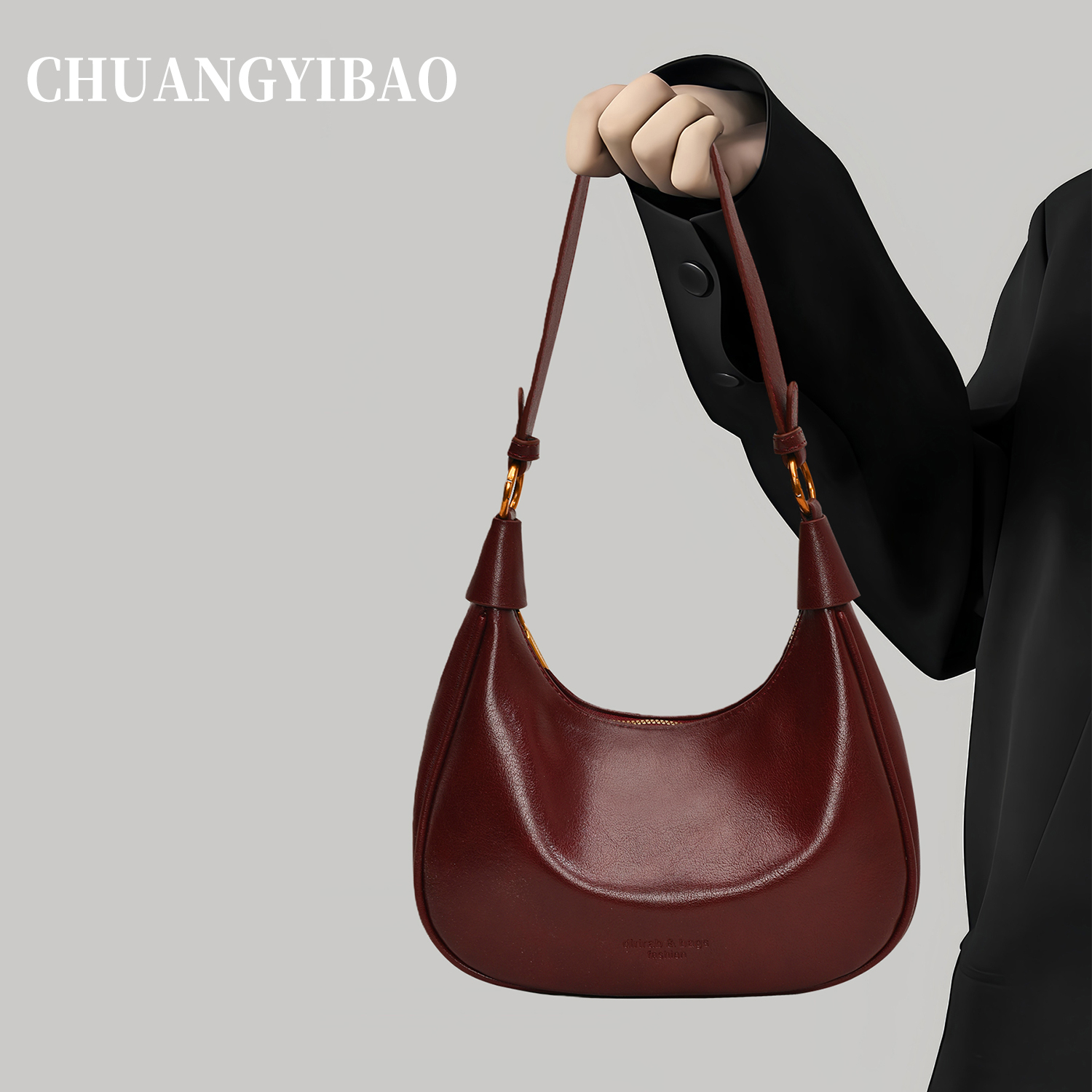 红色超火腋下包包女式2025新款轻奢小众高级感通勤斜挎饺子包婚包