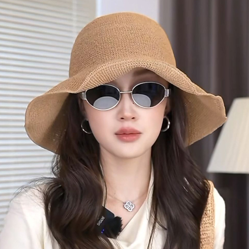 夏季新款手工编织草帽子女镂空透气渔夫帽防晒海边出游百搭遮阳帽