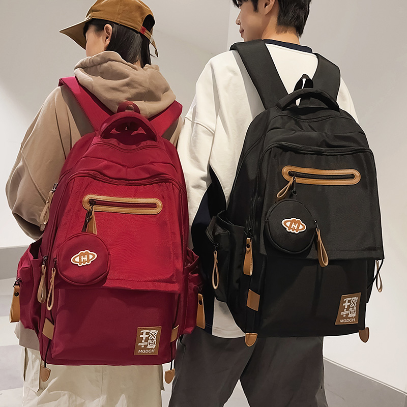 减负护脊大容量书包女初中生高中学生双肩包男大学生女款旅行背包