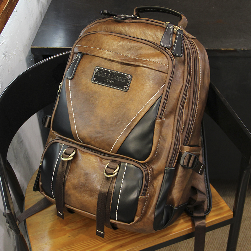 电脑包韩版个性大容量双肩包欧美学生书包男士出差旅行登山包潮