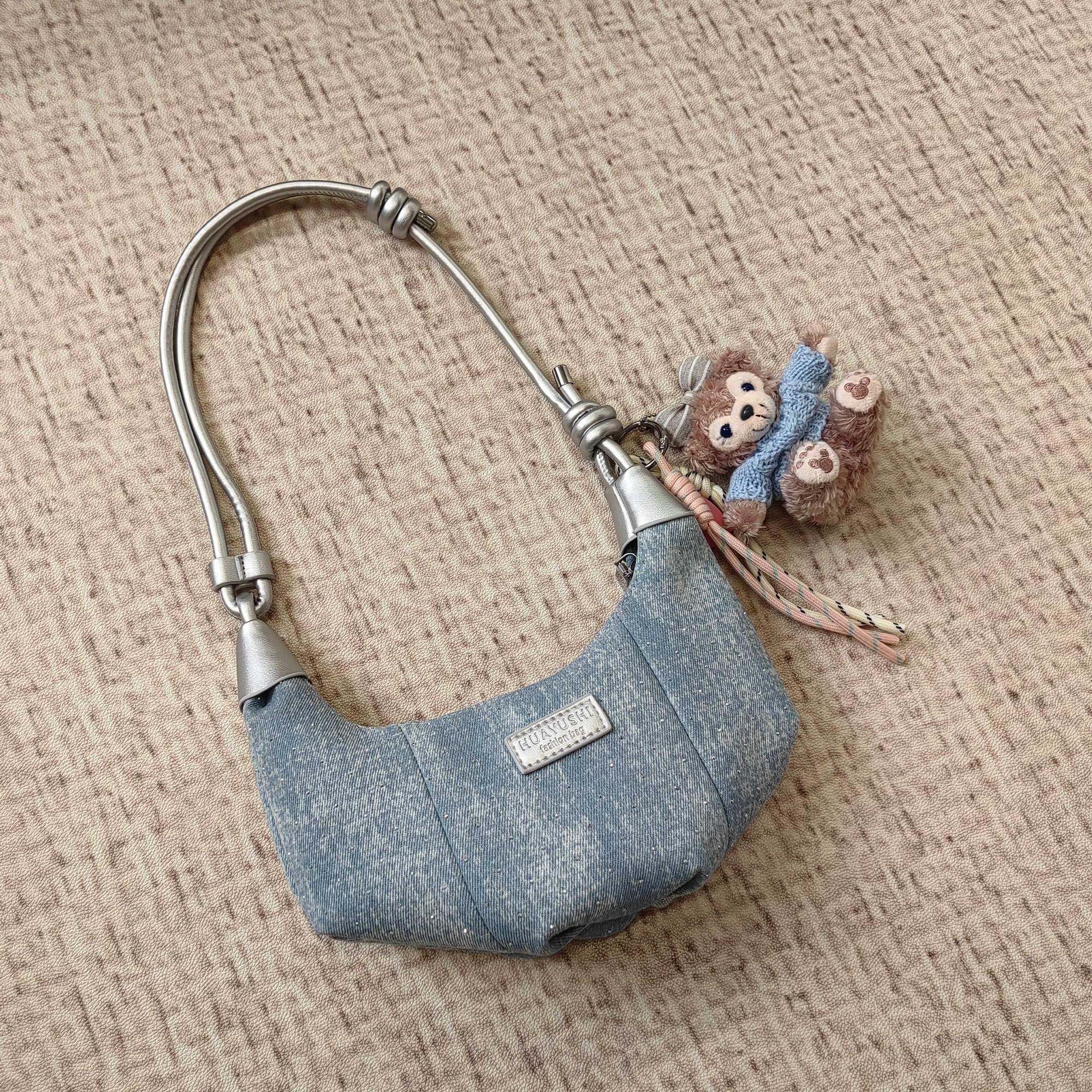 新疆西藏包邮2025夏季牛仔新款精致小牛角腋下包时尚通勤百搭单肩