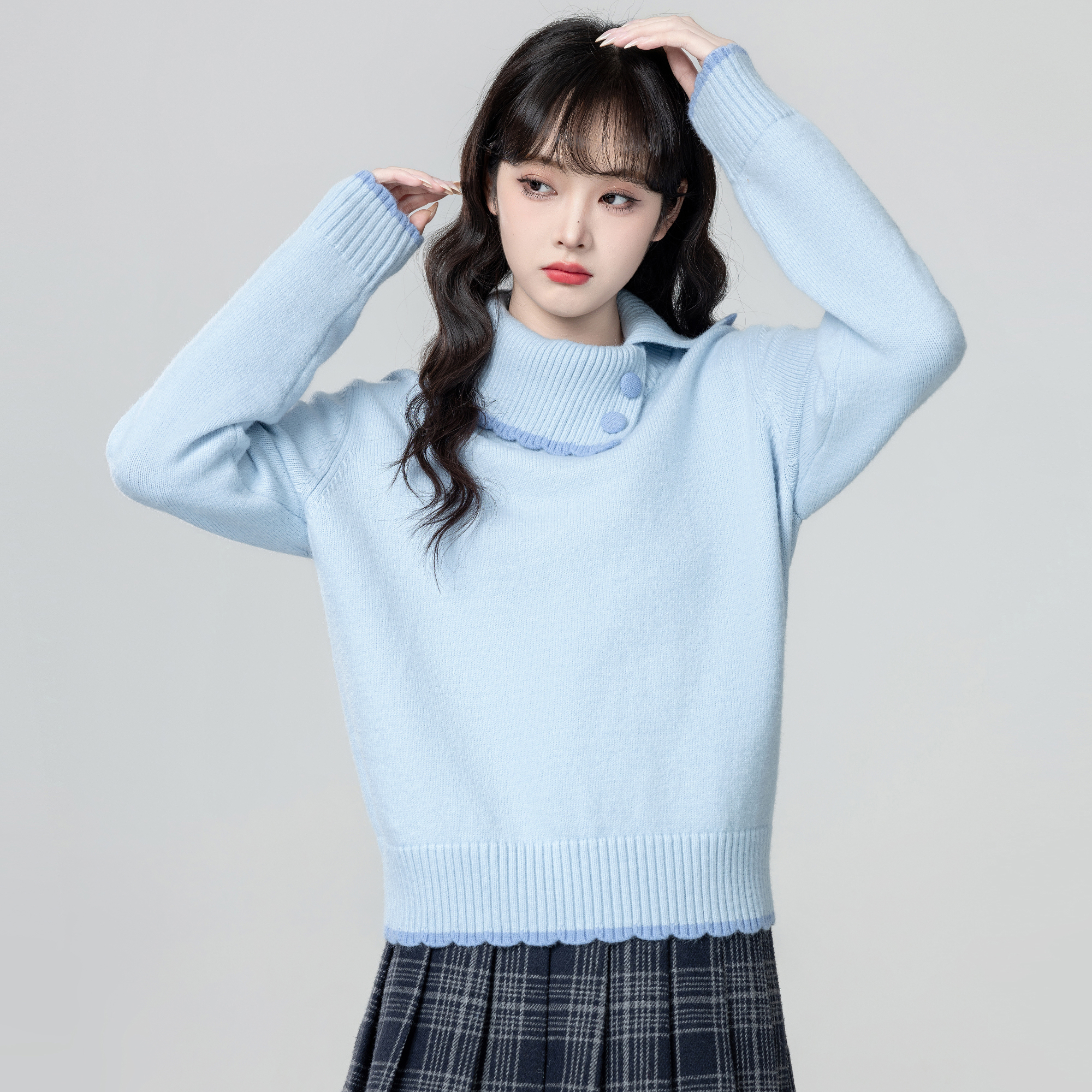 蓝色不规则翻领毛衣女秋冬2025秋季新款设计感加厚针织衫内搭上衣