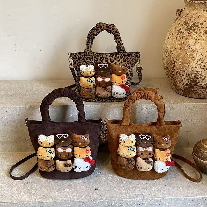 新款秋冬小豹纹流行百搭单肩斜挎包可爱卡通猫咪时尚手提水桶包