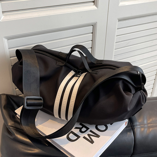 大容量包包女2025新款时尚斜挎包单肩休闲百搭通勤轻便旅行帆布包