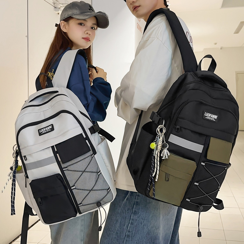 高颜值交叉绳双肩包女休闲百搭背包男高年级初中高中大容量书包潮