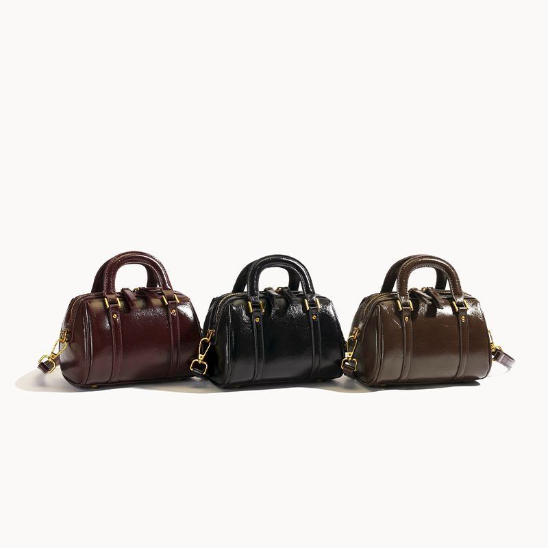 手提波士顿包包女式2025新春夏冬枕头包复古时尚圆筒斜挎包