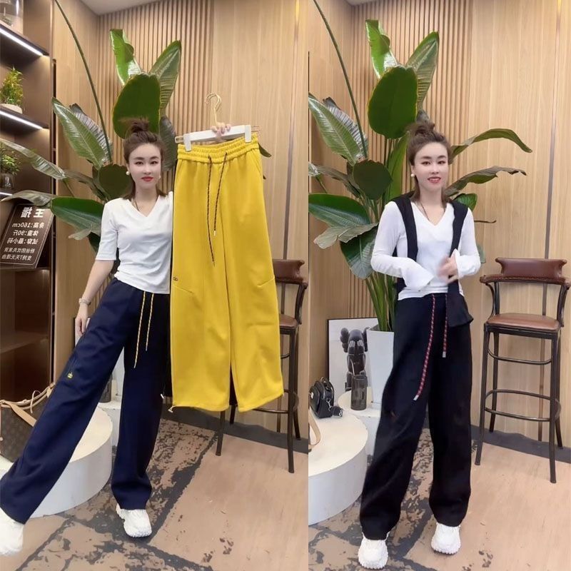 黄色窄版弯刀裤女2025年春秋新款松紧高腰垂感显瘦休闲裤子阔腿裤