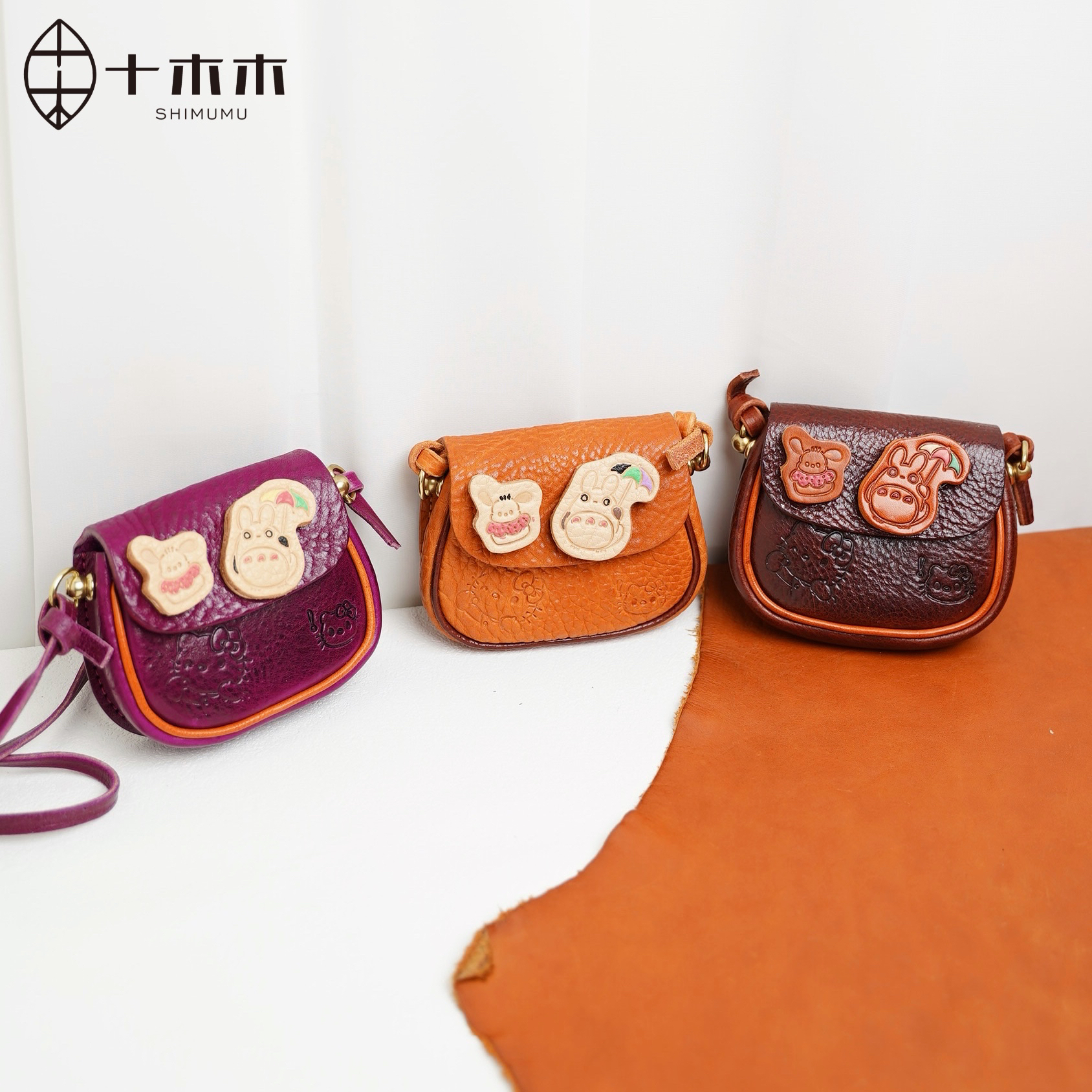 十木木加厚植鞣牛皮凯蒂猫迷你口红包可爱俏皮斜挎包小众高级设计