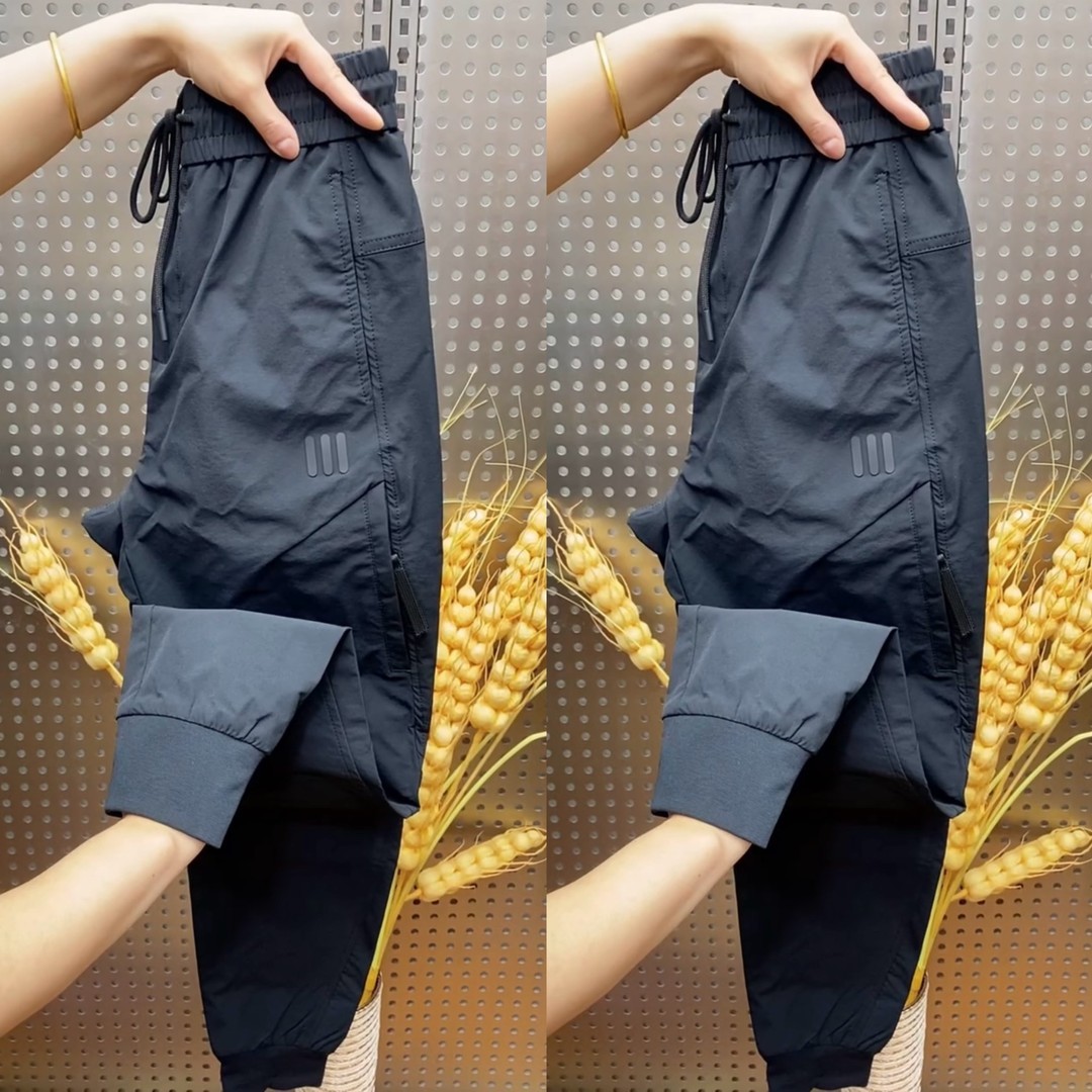 高档秋冬新款男士户外工装裤潮牌拉链速干休闲裤松紧腰弹力小脚裤