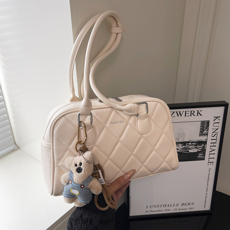 大容量保龄球包包女2025夏日新款简约手提单肩包菱格通勤波士顿包