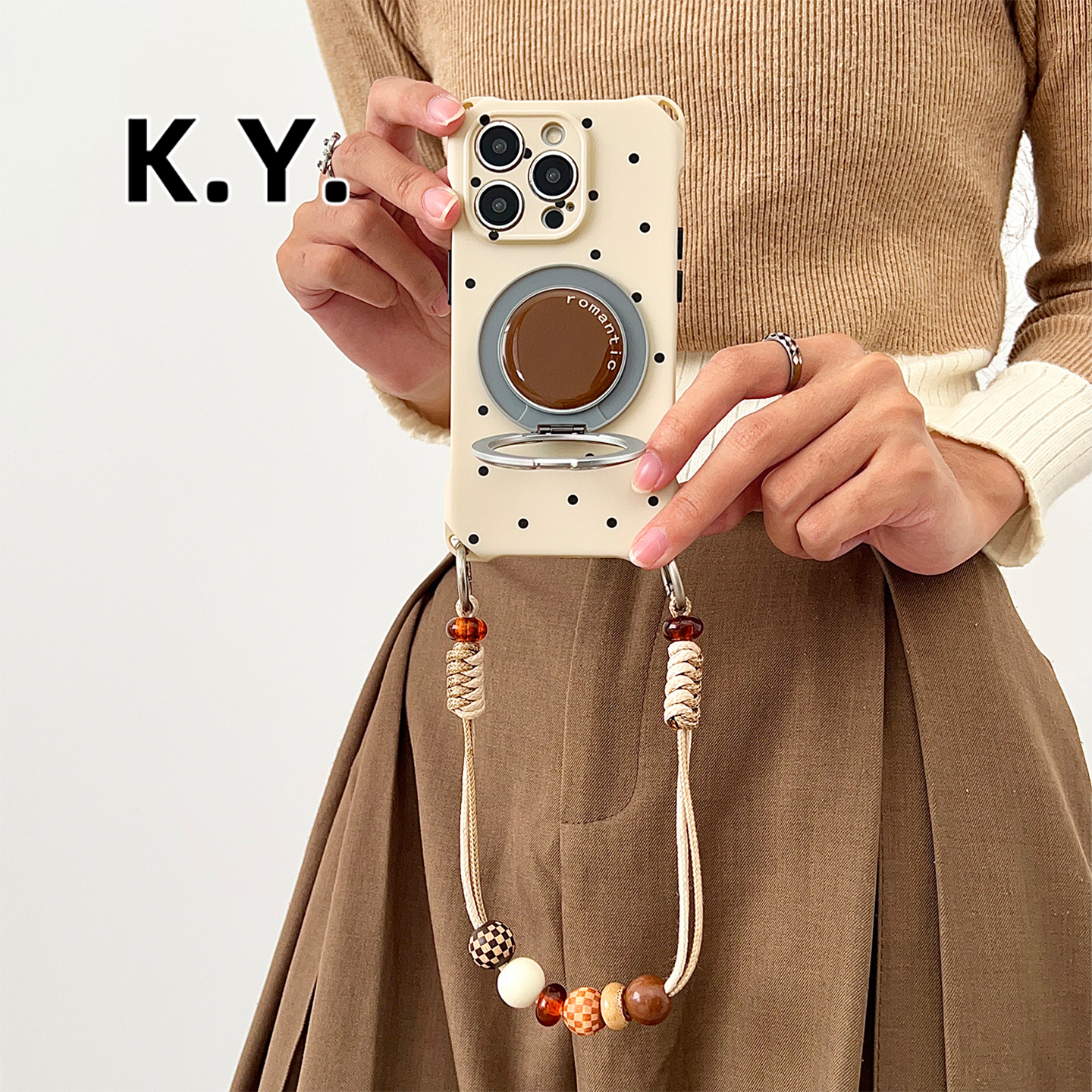 棕底英文旋转支架手机壳背带斜挎适用于苹果华为手提斜挎可背防摔