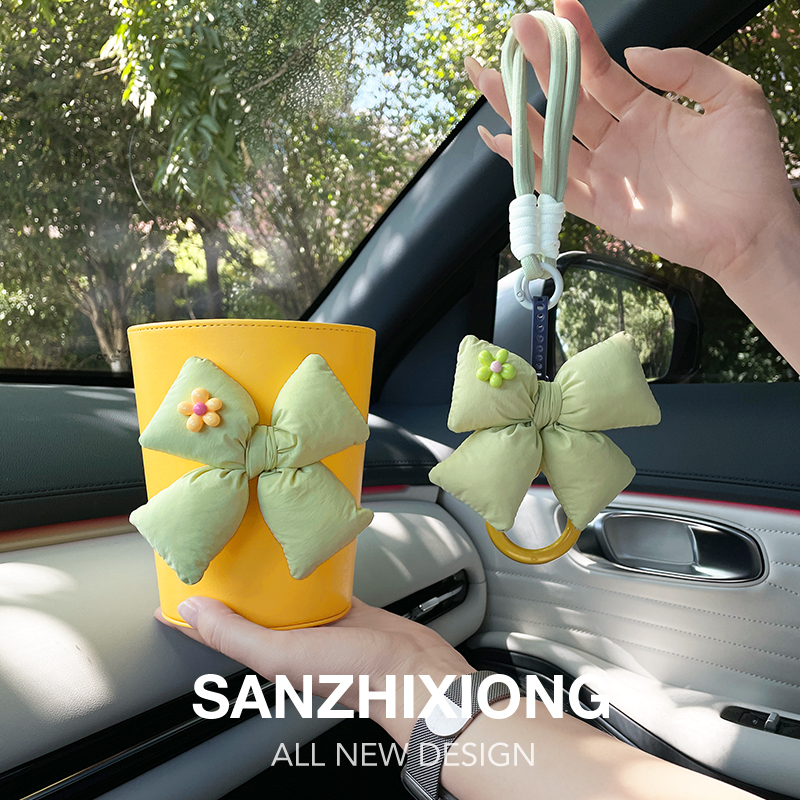 汽车垃圾桶创意蝴蝶结车内垃圾桶座椅收纳杂物出风口挂袋车载挂钩