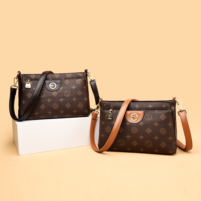 包包女单肩斜挎包2025新款多层日常百搭小包包真皮通勤超火小挎包