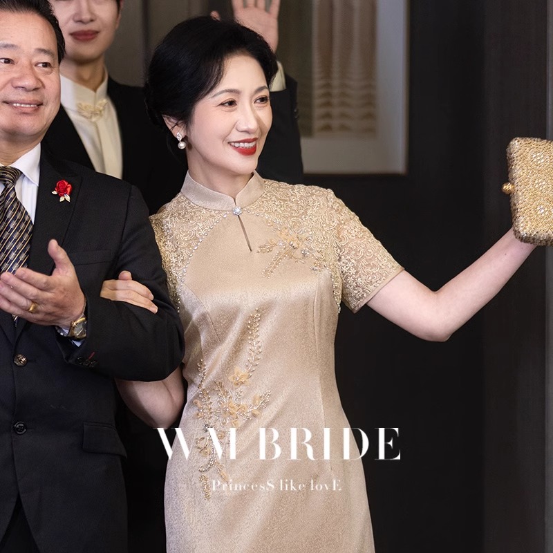 喜婆婆婚宴装2025新款妈妈婚礼礼服高端轻奢金色结婚新中式旗袍女