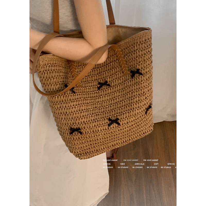夏天百搭编织包包女款2025新款小众通勤单肩包度假风草编托特包