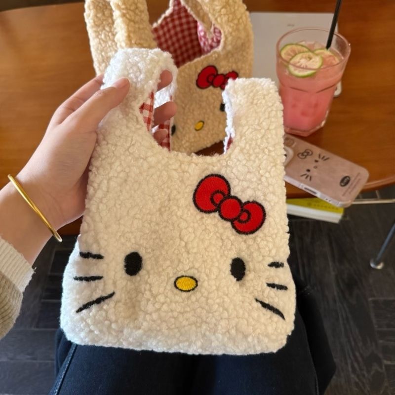 可爱Kitty秋冬猫咪手提包羊羔格子手腕卡通上班通勤包包拎包yj