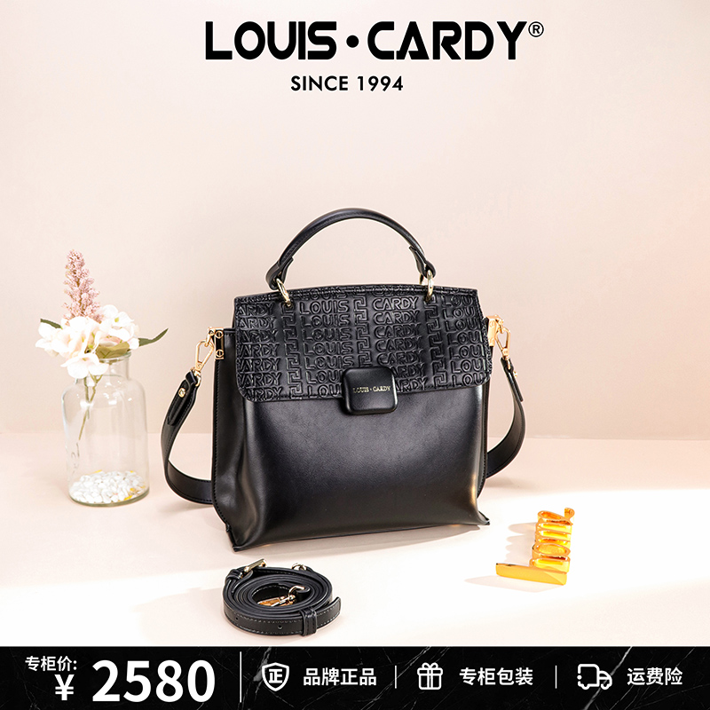 路易卡迪 双面背黑色字母压纹翻盖手提单肩斜挎水桶包配两条肩带