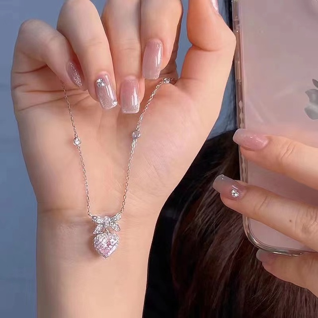 阿吉豆蝴蝶结爱心项链女纯银2025年新款公主结粉色少女镶嵌设计感