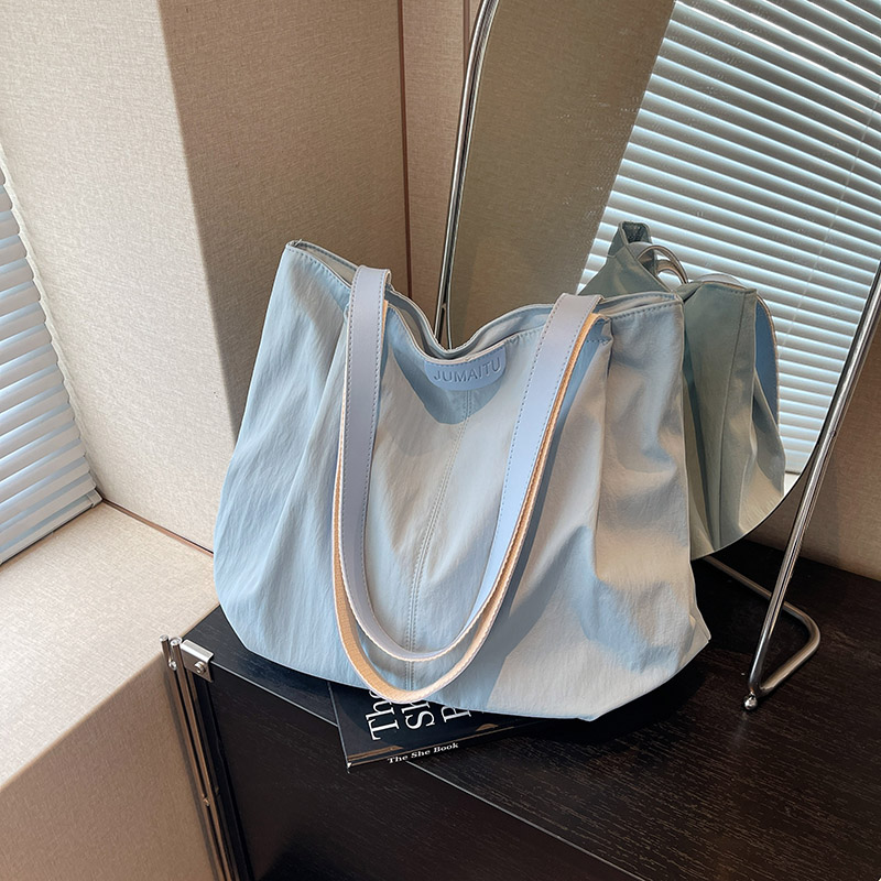 佐猫包包女款爆款2025新款休闲大容量包包单肩包布袋大学生通勤包