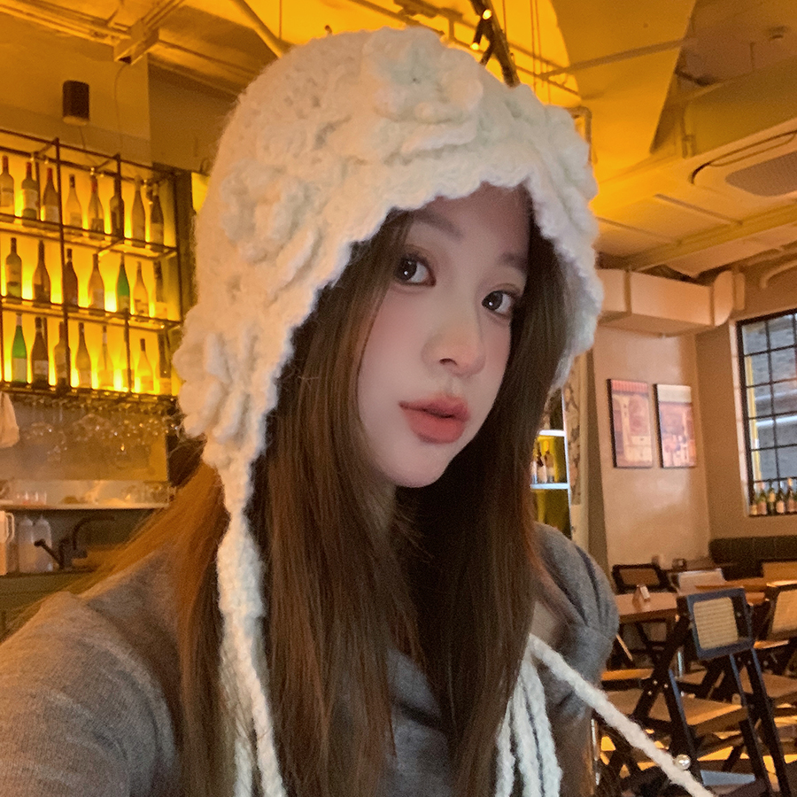 落雪白100纯手工帽子女冬2025新款羊毛流苏毛线帽绑带护耳雷锋帽