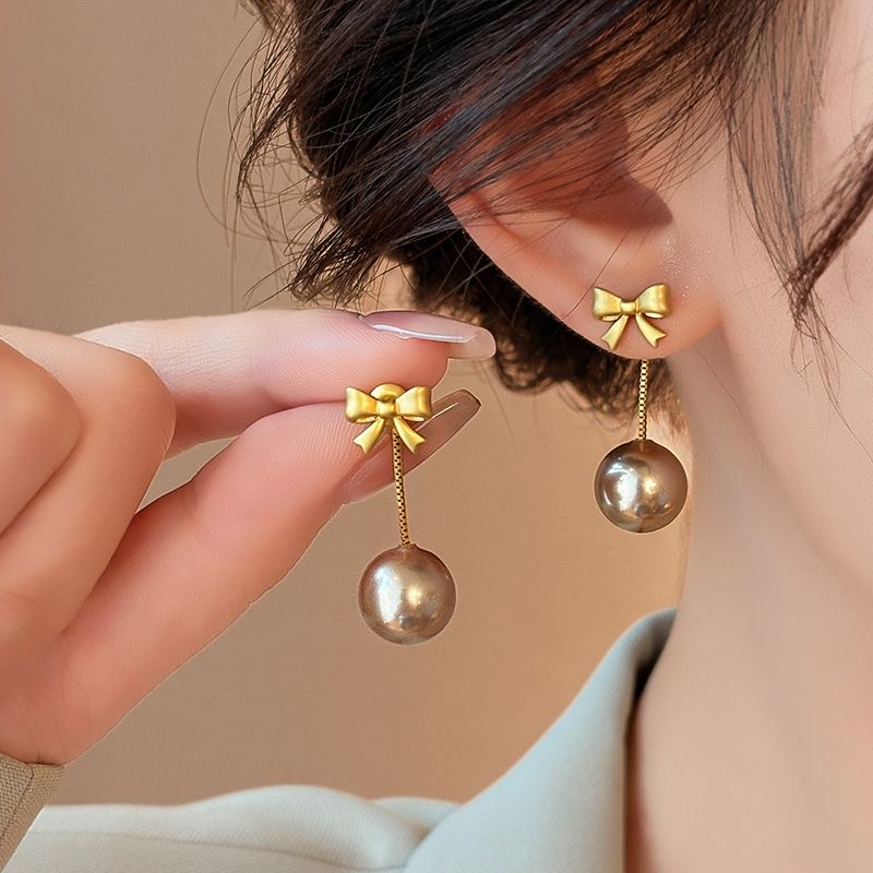 秋冬法式轻奢香槟珠珠吊坠耳环2025新款蝴蝶结耳钉小众高级感耳饰