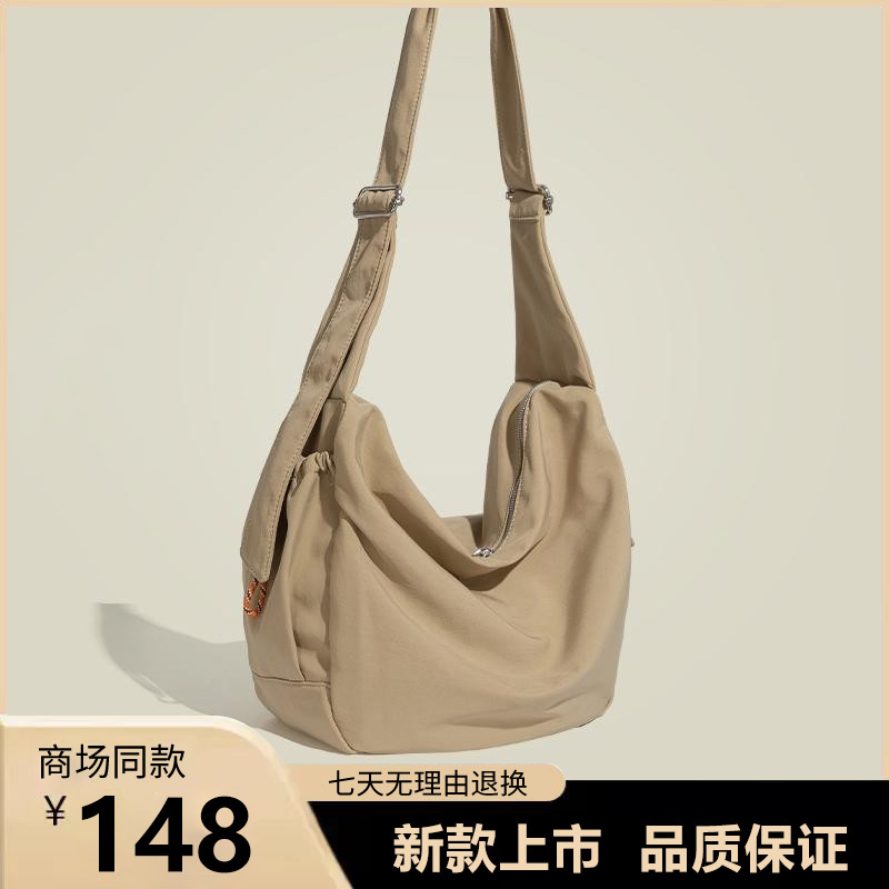 日系运动百搭饺子包女2025新款春夏季简约大容量通勤单肩斜挎包