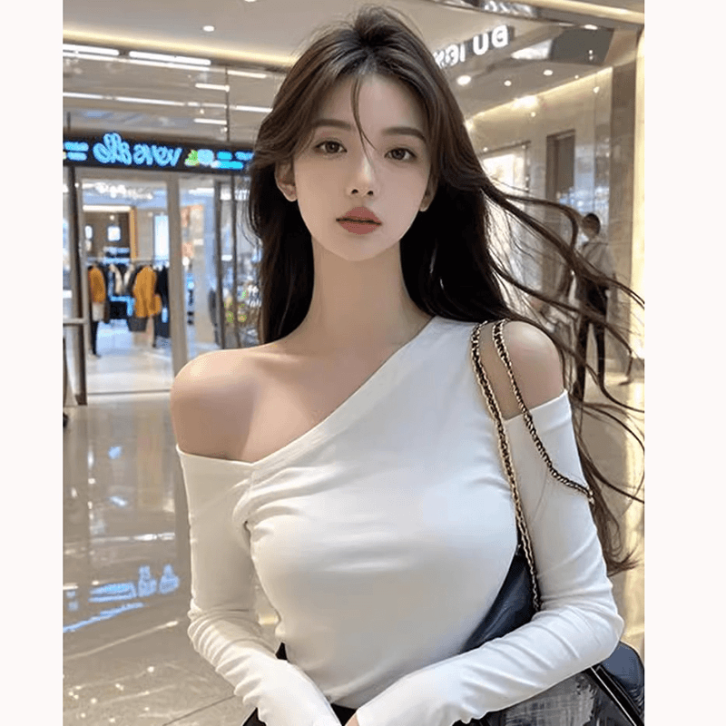 性感辣妹镂空斜露肩上衣女秋季别致设计感内搭打底衫白色长袖T恤