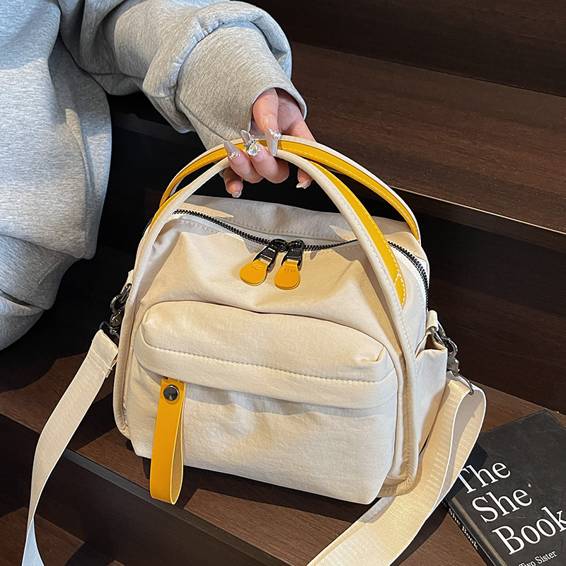 帆布包包女轻便2025新款潮高级感牛津布上班通勤大容量手提斜挎包