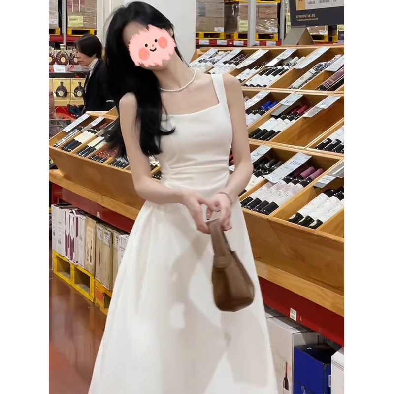 法式气质高级感吊带连衣裙女春夏季小白裙结婚证高腰显瘦白色长裙