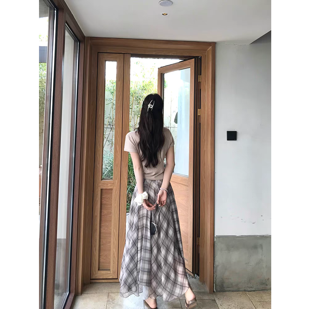 韩系时尚格纹半身裙女2025新款秋季新款长款不规则A字格子裙