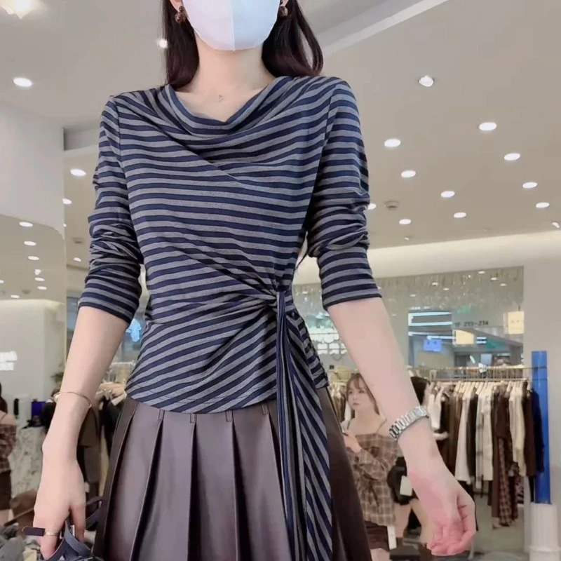 今年流行纯色长袖不规则T恤女秋季2025新款设计感收腰韩版ins上衣