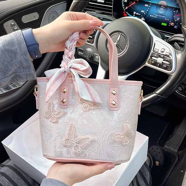 SKT STY小众蝴蝶结大容量水桶包包女爆款2025新款百搭手提斜挎包