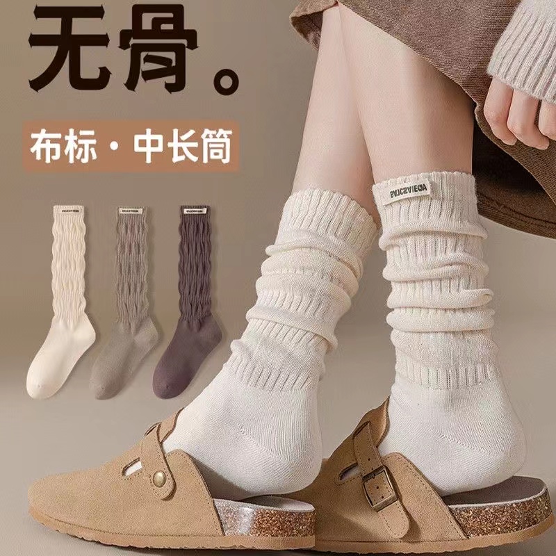 堆堆袜子女无骨缝合中筒棉袜ins潮流百搭字母布标四季款长筒袜
