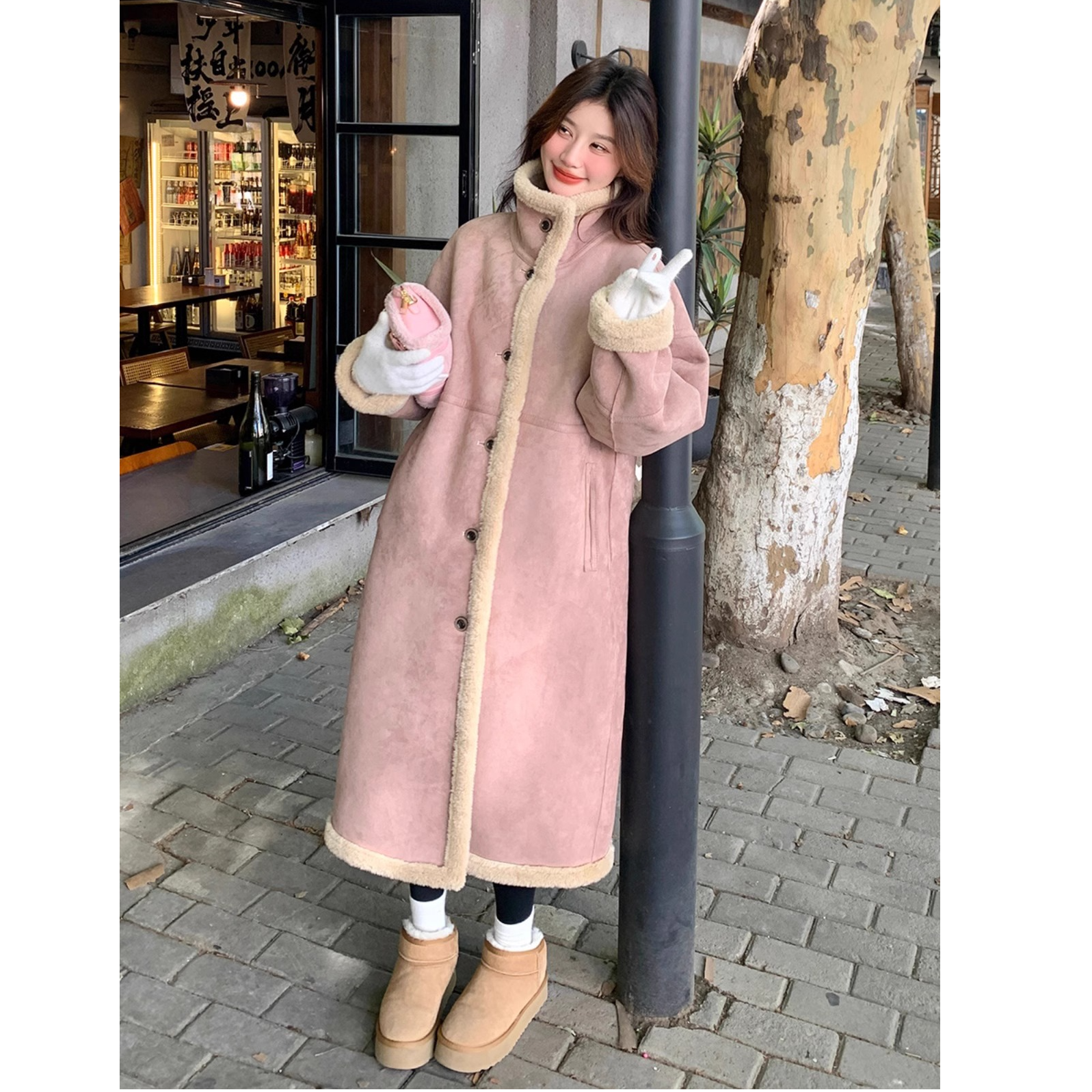 粉色设计感皮毛一体大衣女2024新款冬季超好看长款加厚羊羔毛外套