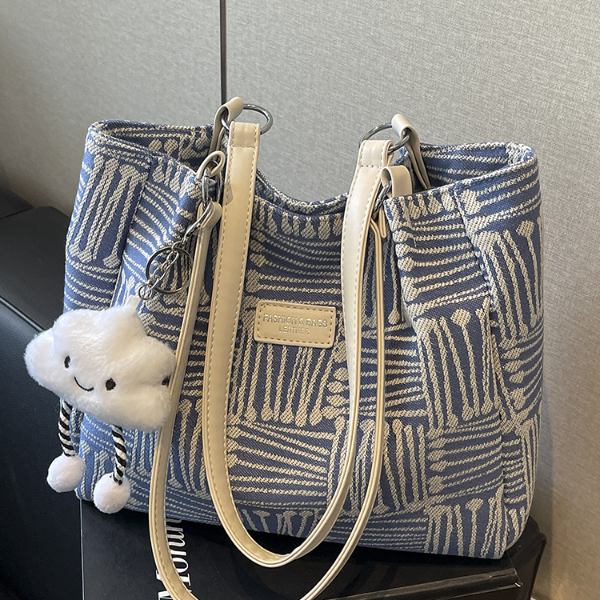 设计感大容量包包2025新款女士单肩包小众百搭通勤专用上班专用包