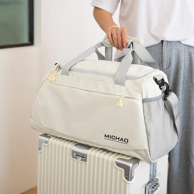探屿手提旅行包大容量女出差包登机学生短途旅游待产行李箱健身包
