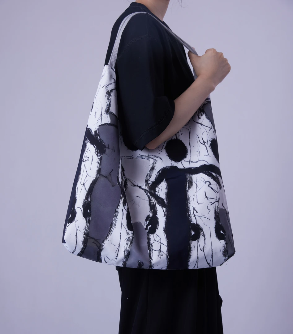 无则艺【月牙包】时尚印花单肩小黑人休闲潮流学生轻便携环保肩包