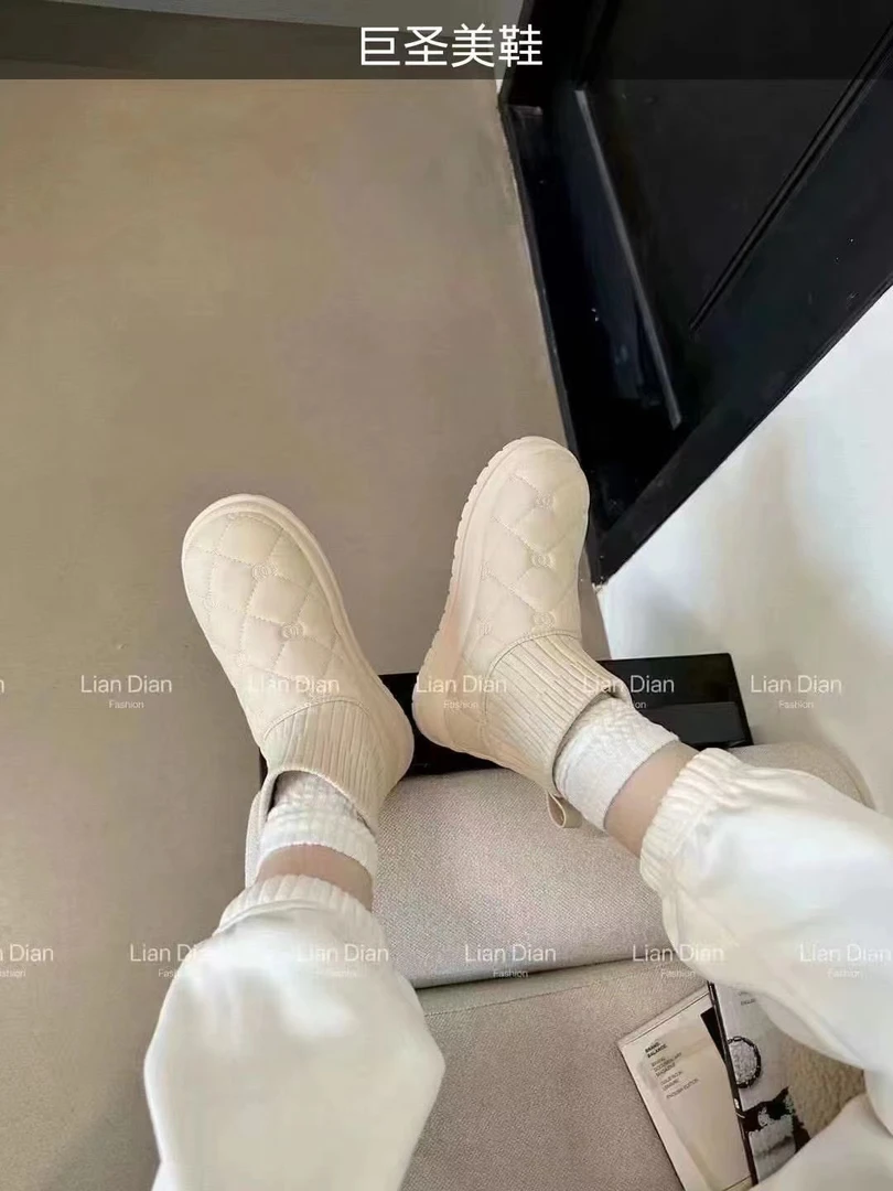 1507-1厚底雪地靴女冬季新款一脚蹬鞋真皮学院风袜口加棉短靴Q2