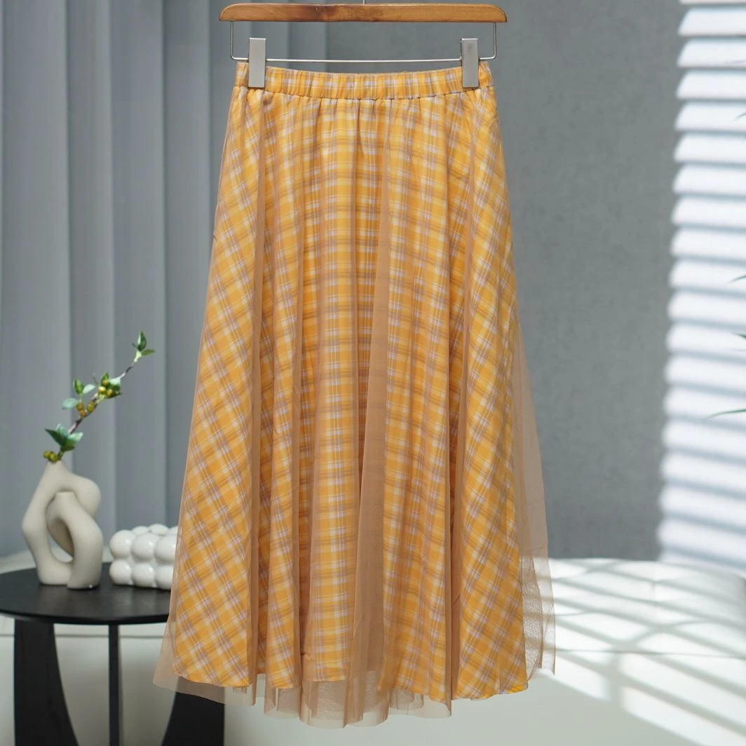 咏系列  Z748   女装时尚撤柜黄格半身裙A3050007
