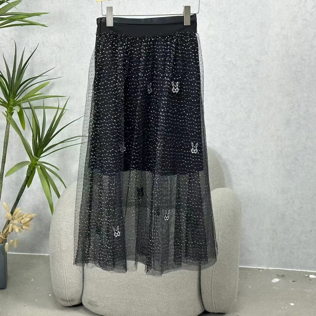 LI丽系列  Z258   女装时尚撤柜网纱半身裙黑色62335101