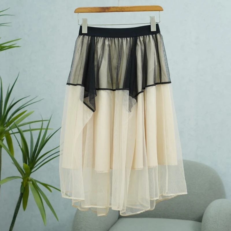 LI丽系列  Z697   女装时尚撤柜休闲网纱半身裙浅米65066061