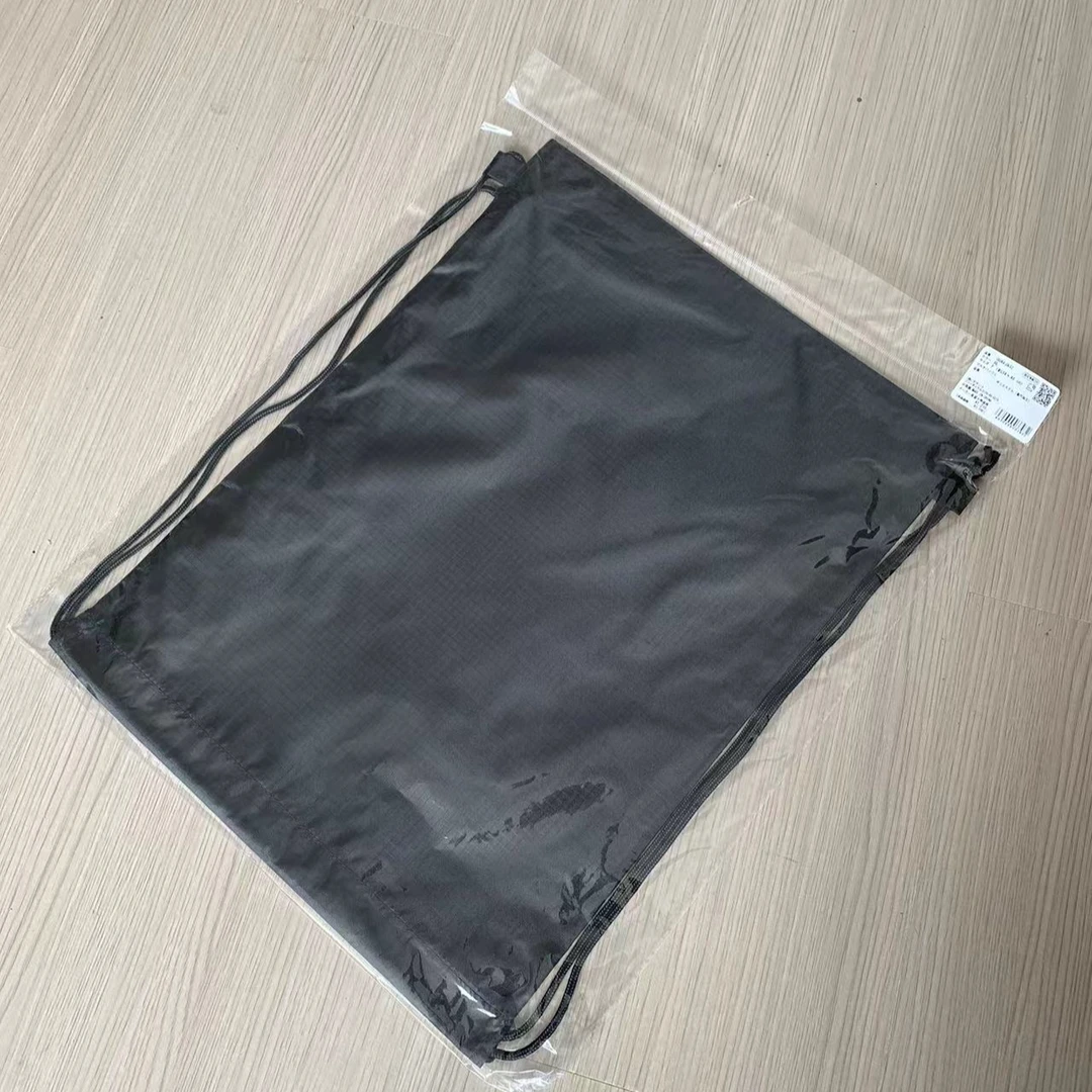 户外时尚休闲抽绳包情侣款收纳袋单肩包百搭黑色防水简约潮流学生