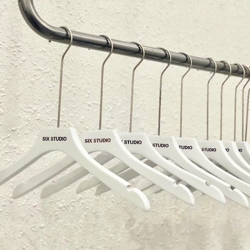 家用无痕服装店专用衣架女装店儿童装纯白色实木木质家用木头衣挂