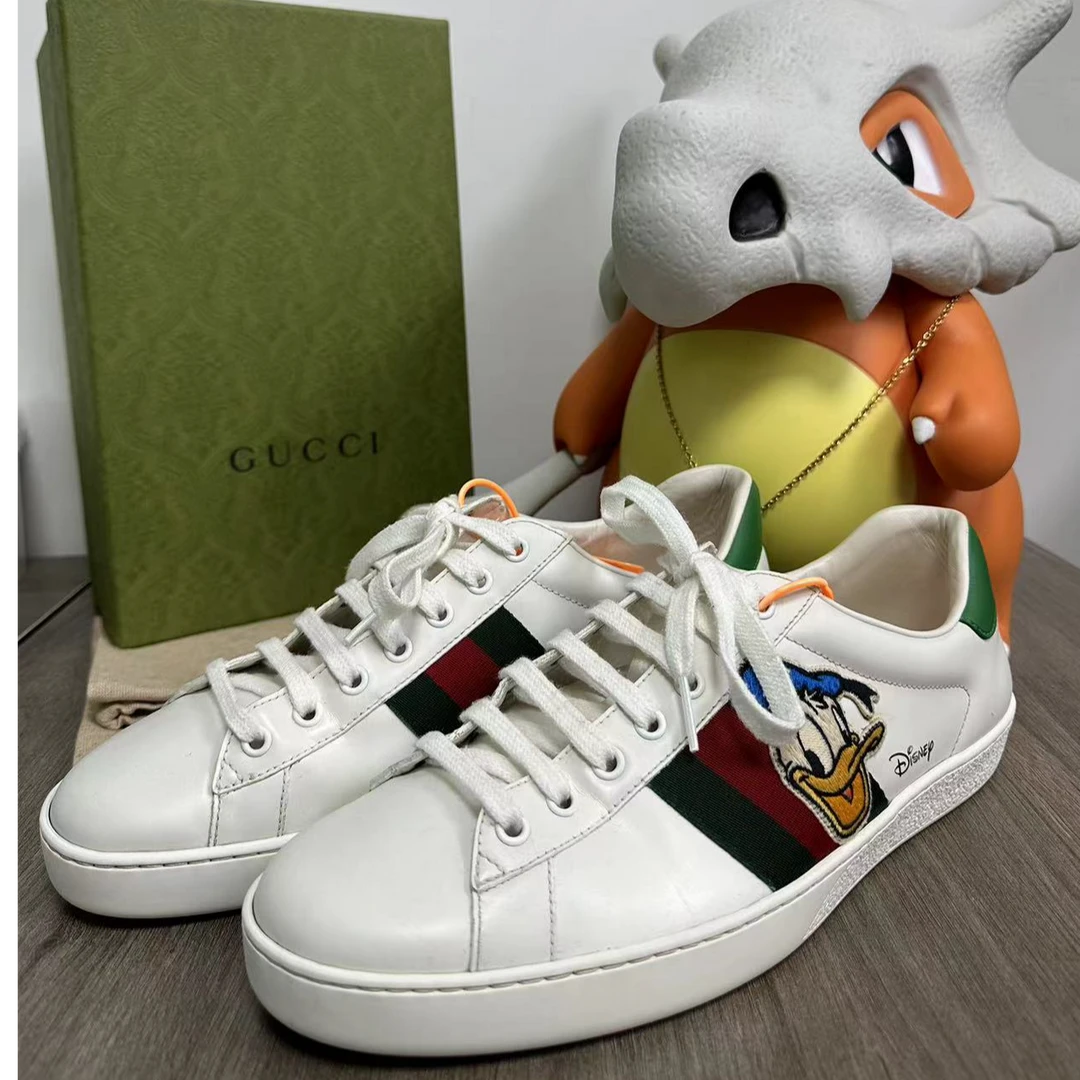 【95新】Gucci 迪士尼唐老鸭ACE男士时尚白色板鞋 43欧码 编号：T509